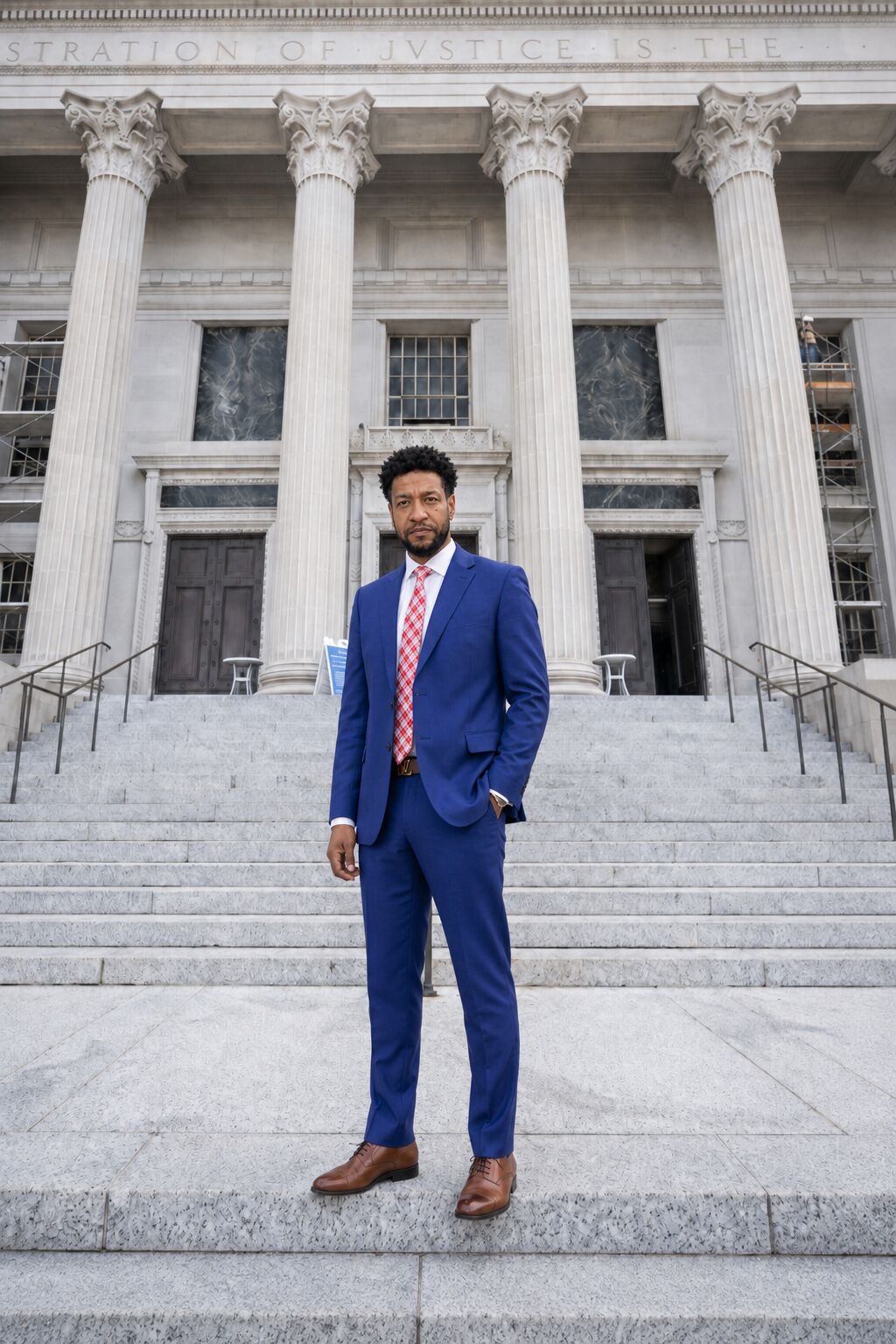 Jerome Matthews standing before courthouse columns